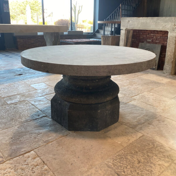 round table with blue stone leg
