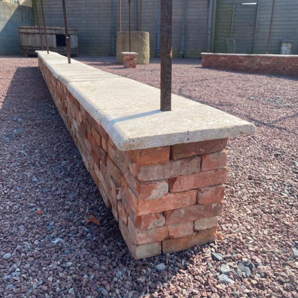 antique gazebo on brick wall